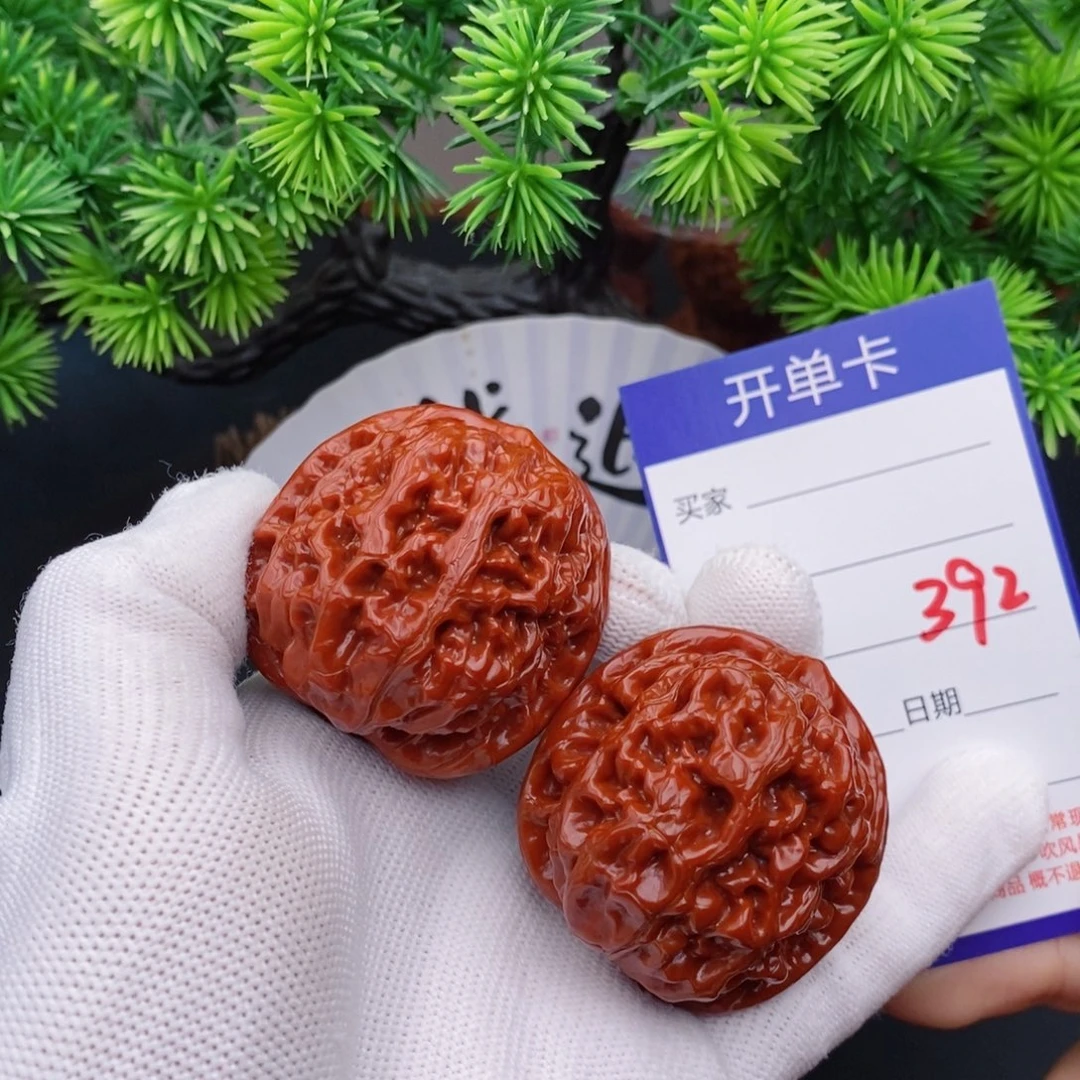 杨***逸文玩核桃把件43凤凰台392