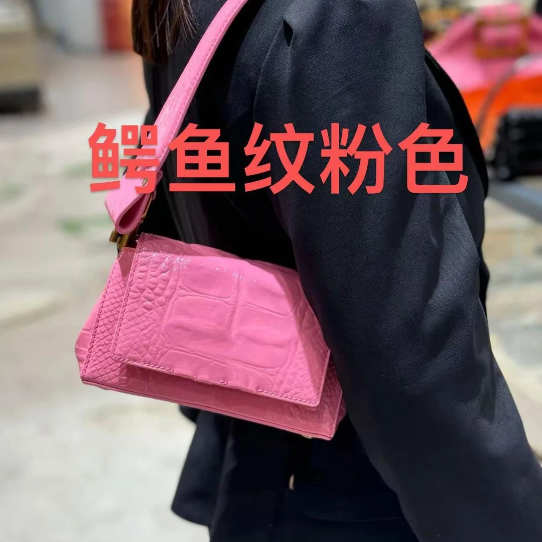 西家粉色皮质腋下单肩包