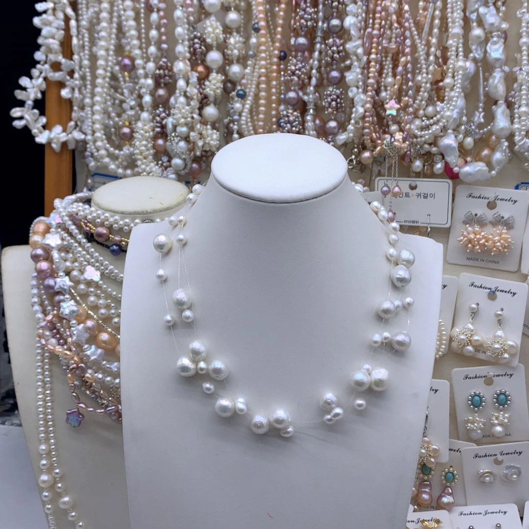 银S925镶嵌淡水珍珠耳饰毛*