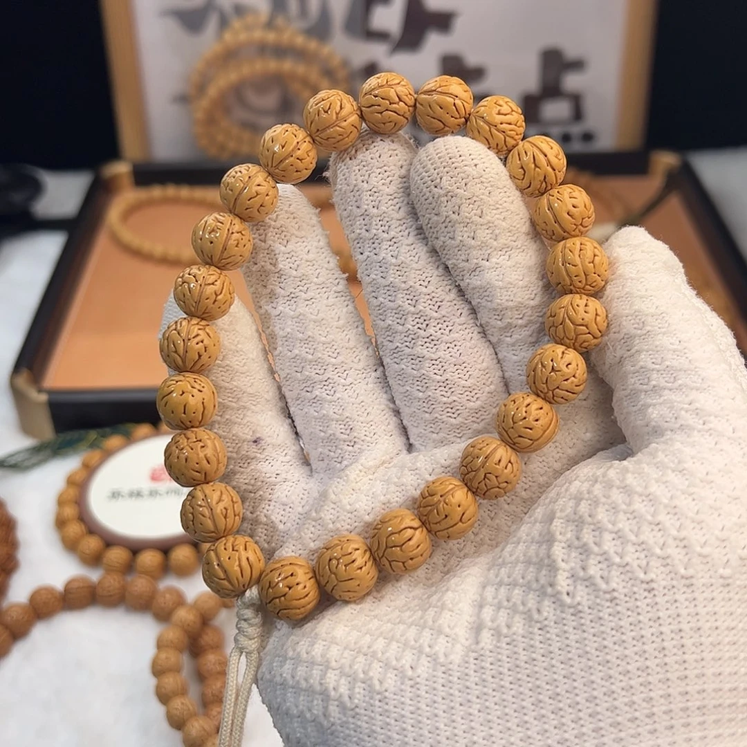 深***瓜桃核手串1.3「大肠纹脐中脐」野生桃核手持