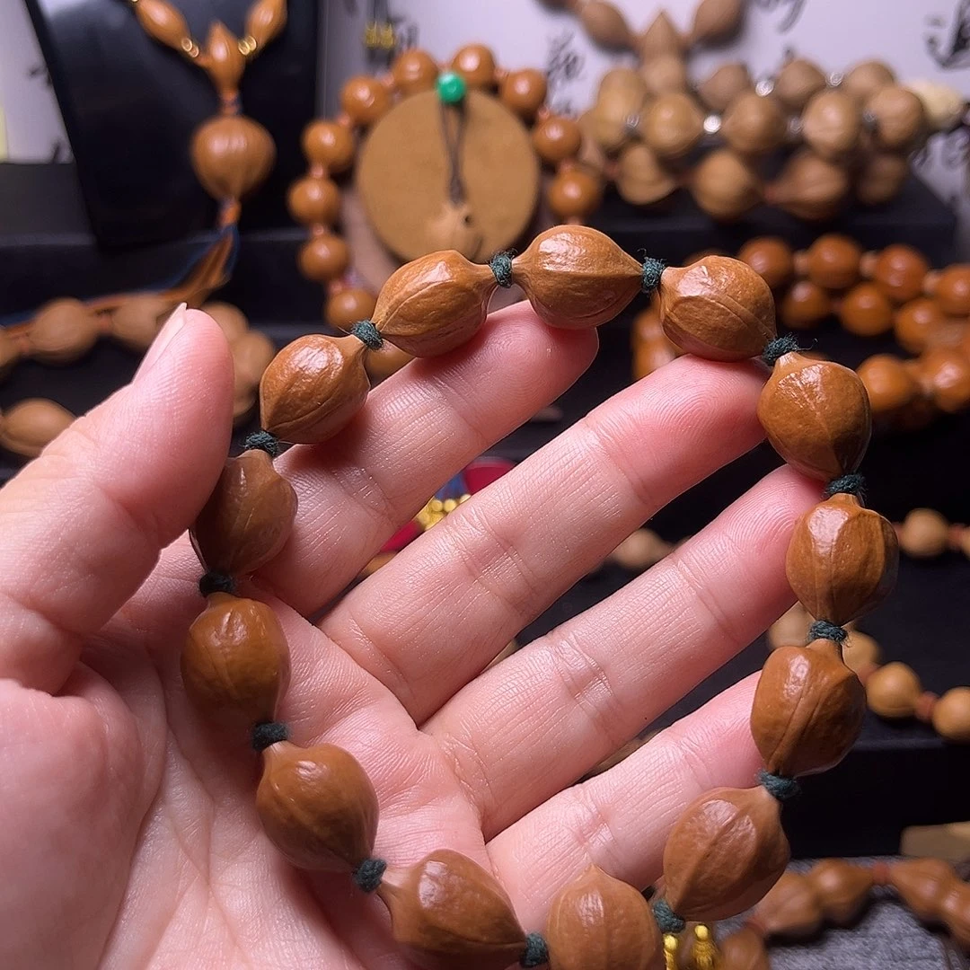 橄榄核手串梅林蜜桃臀14.18