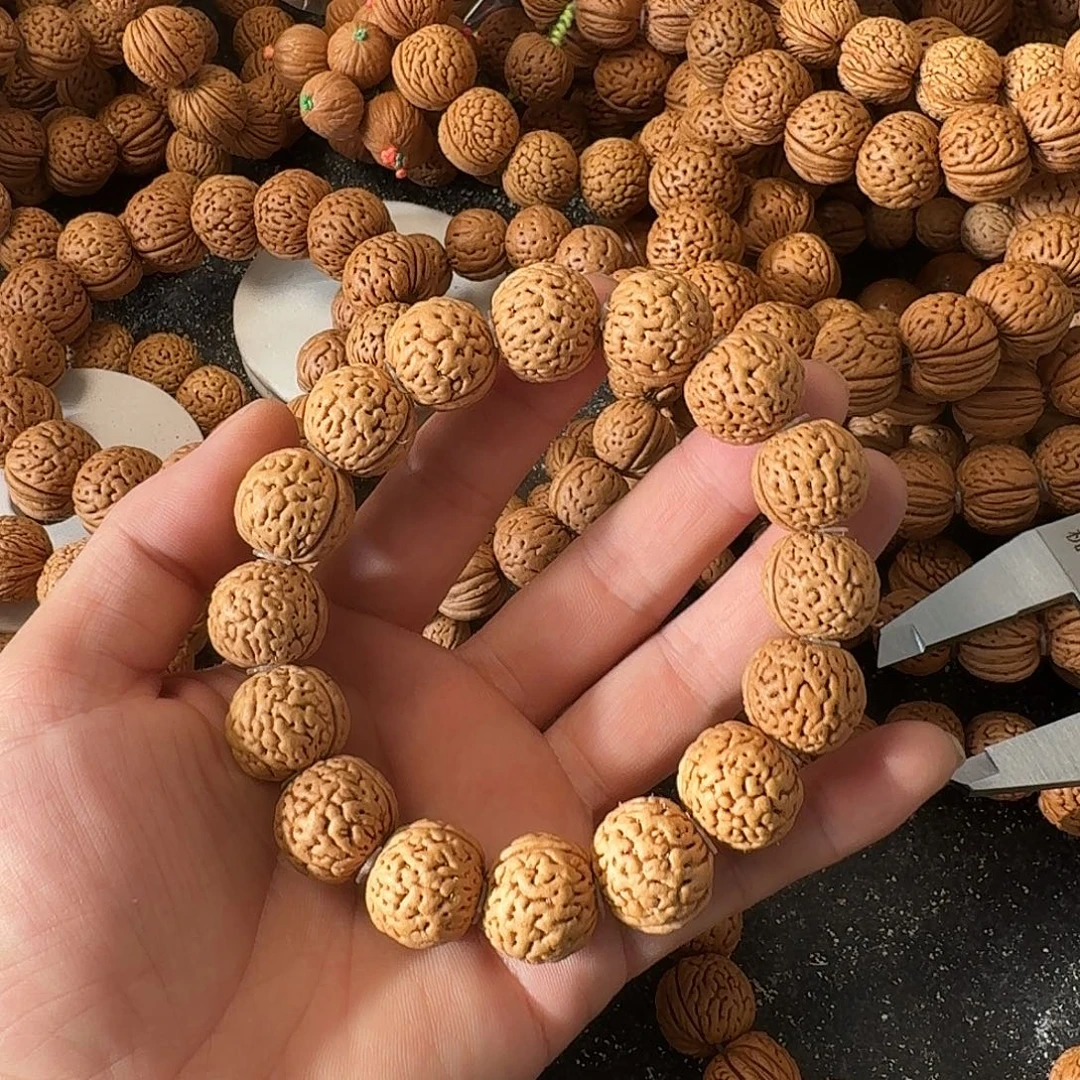 *****桃核吊坠野生手串