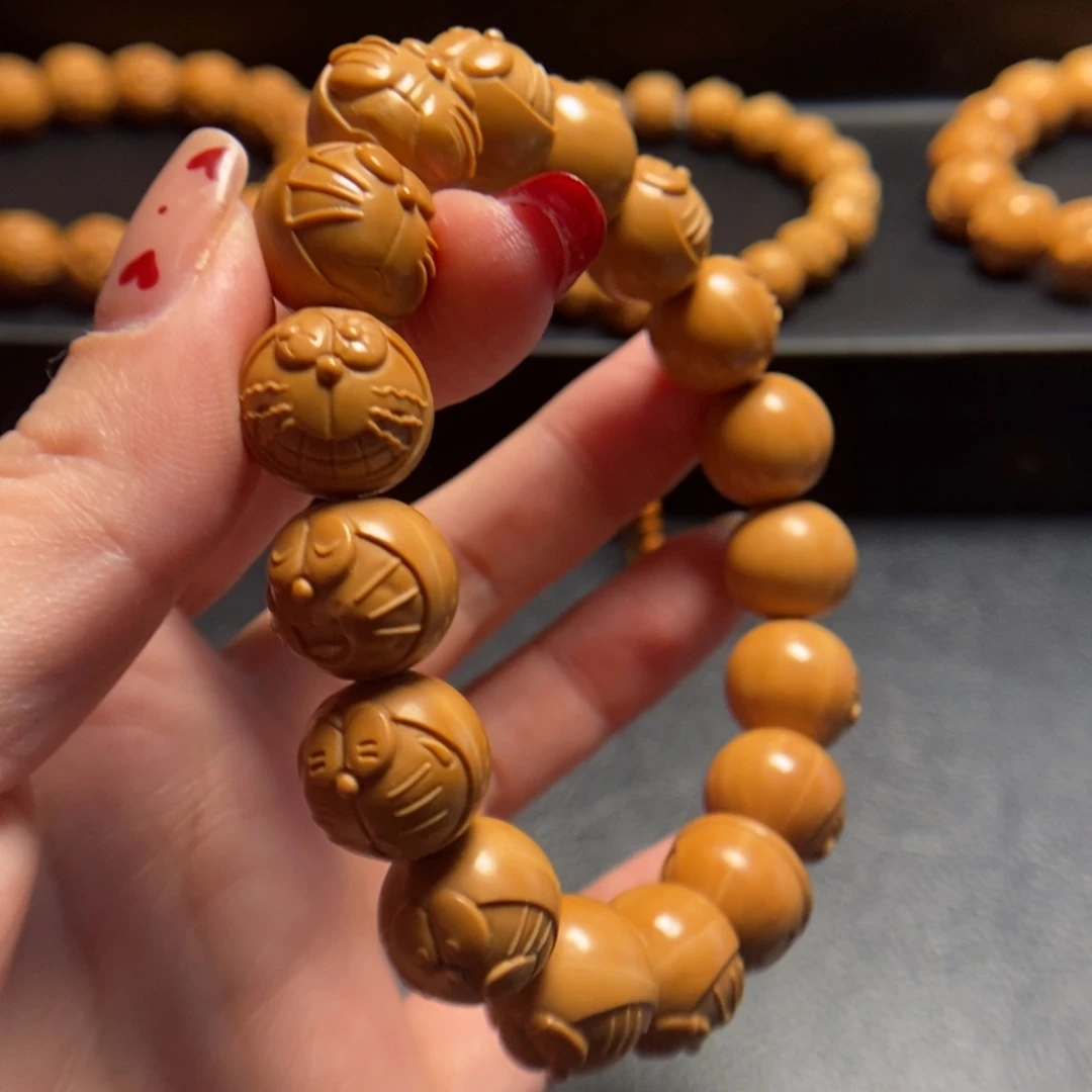 猴头核桃手串峰*?机器猫