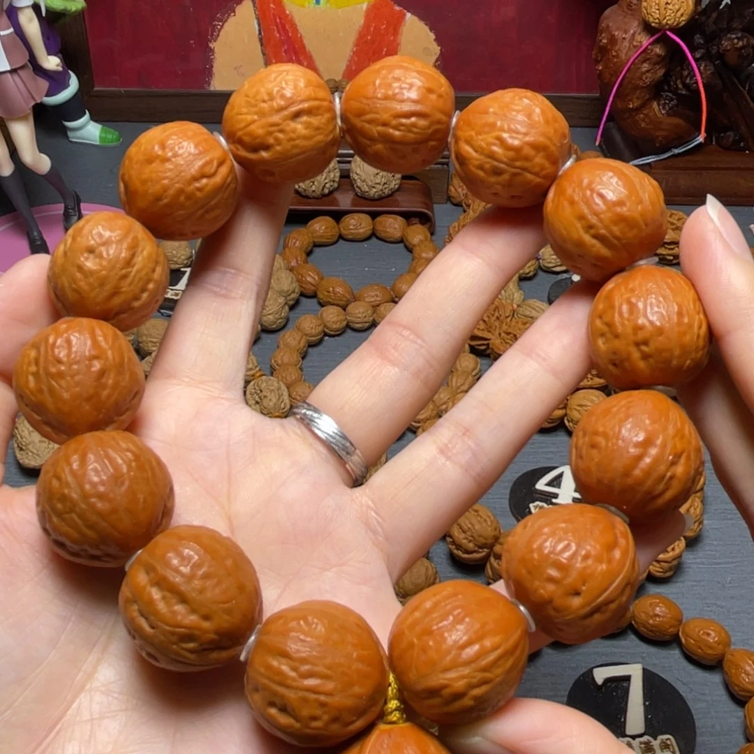 核桃红皮光头桃心手持88