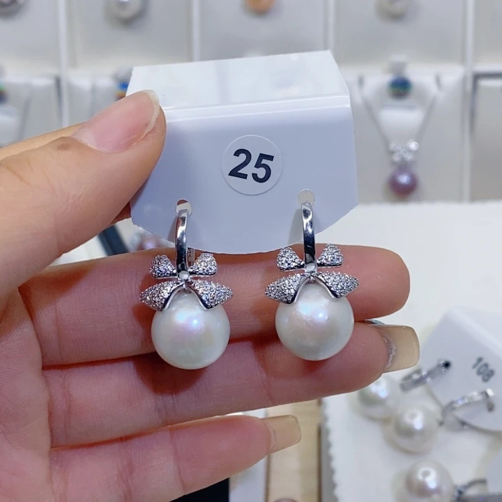 哈****淡水珍珠耳饰银S925镶嵌