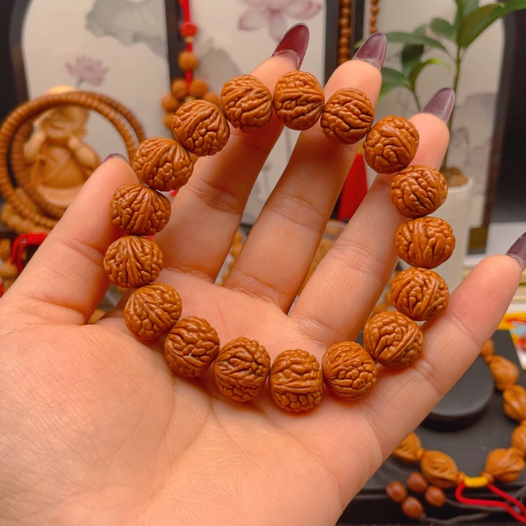 手串桃核红魔荔枝纹。红红火火