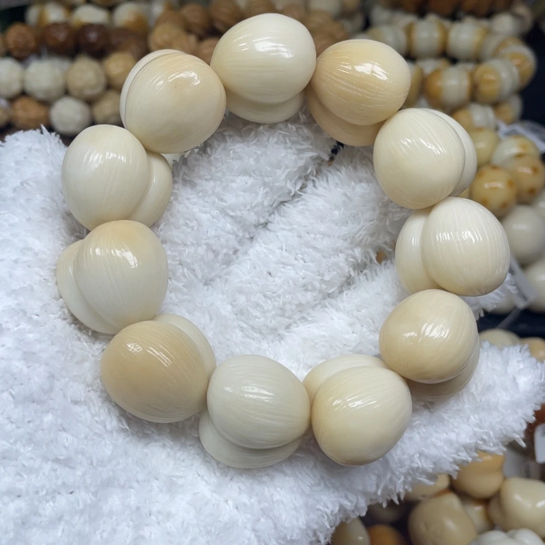 手串菩提根/象牙果12.8.28拉丝屁桃