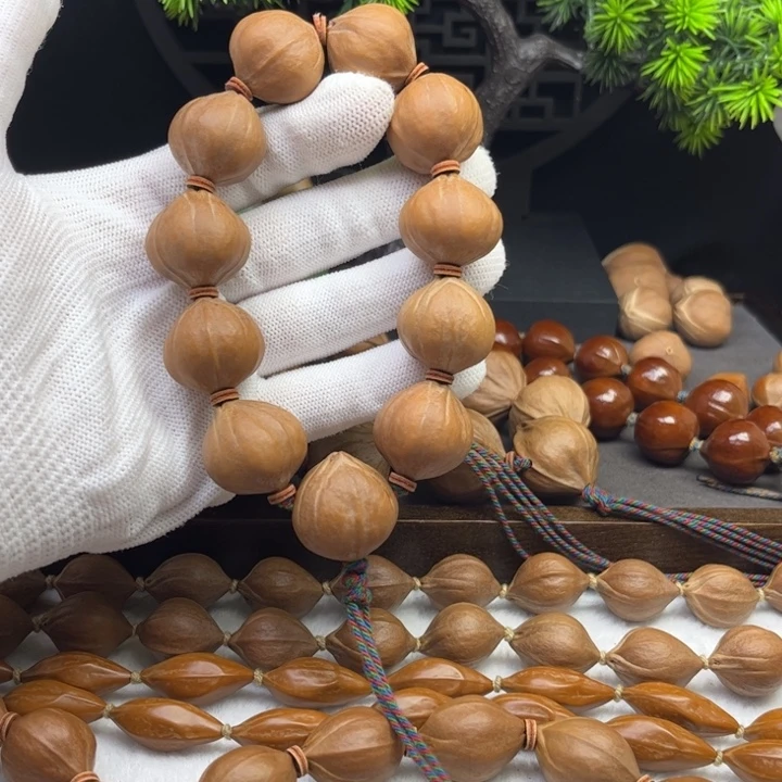 黑***马橄榄核其他2.2*2.2原皮三花铁核11颗