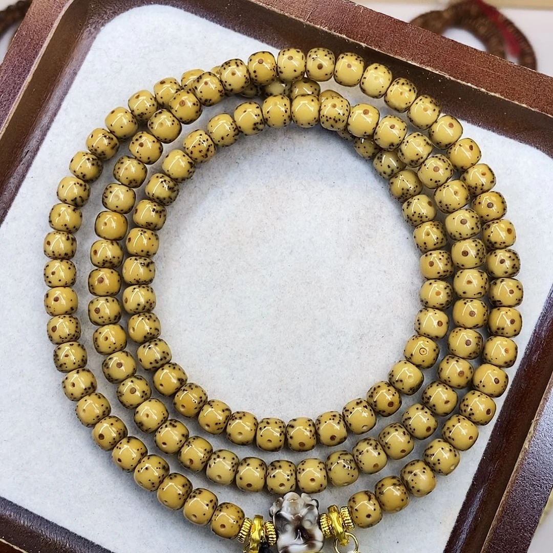 星月菩提吊坠7×6石玉鸡油黄大眼睛