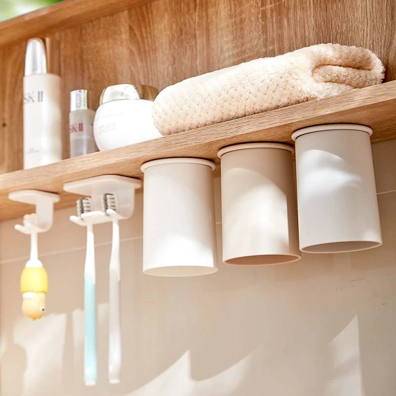 deHub牙刷杯置物架磁吸倒挂漱口杯镜柜收纳简约家用洗漱杯情侣杯