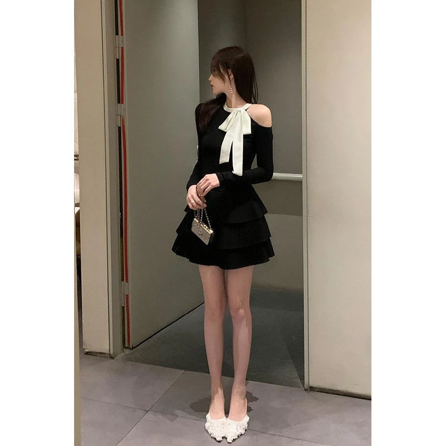 黑色露肩上衣女设计感小众短款修身蝴蝶结长袖针织衫百褶裙两件套