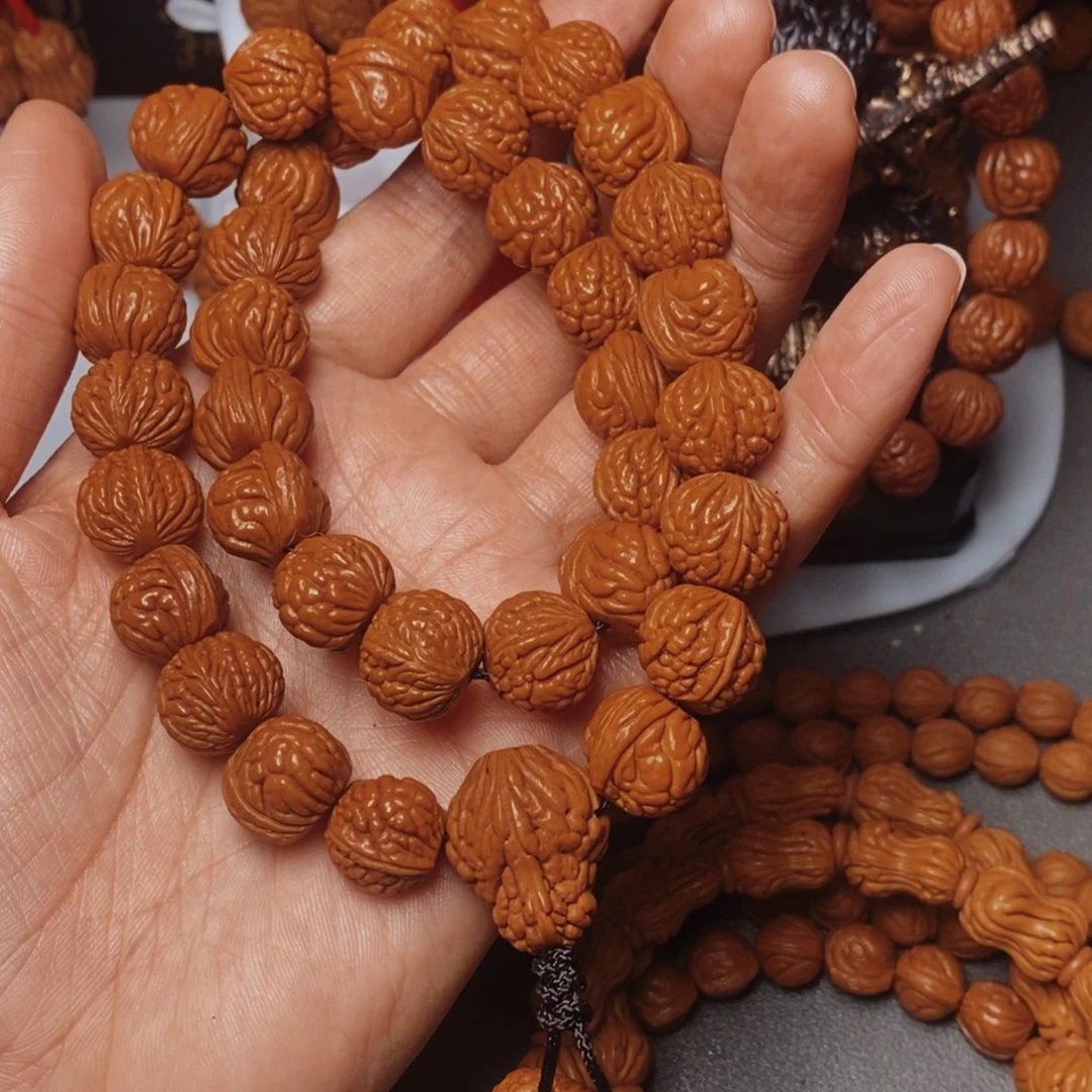 农***哥吊坠桃核桃枭手持1