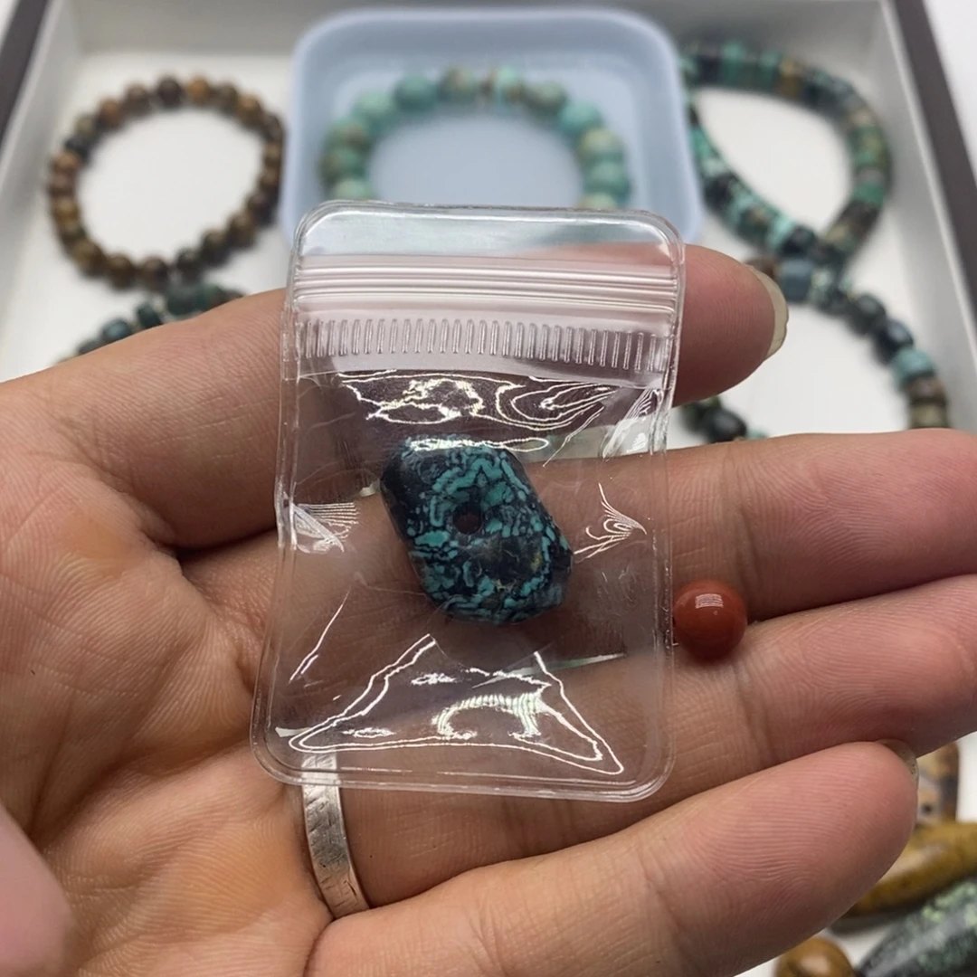 喵***吉未镶嵌南红玛瑙珠宝奇石