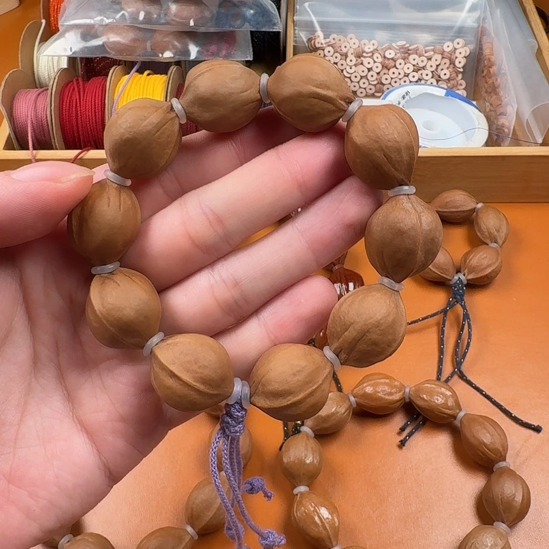 吊坠橄榄核19.24边肚同尺