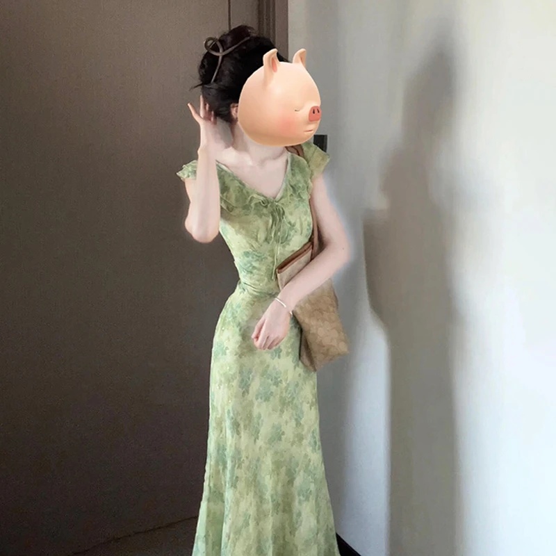 法式茶歇绿色碎花连衣裙子女夏季2025新款荷叶边气质小众收腰长裙