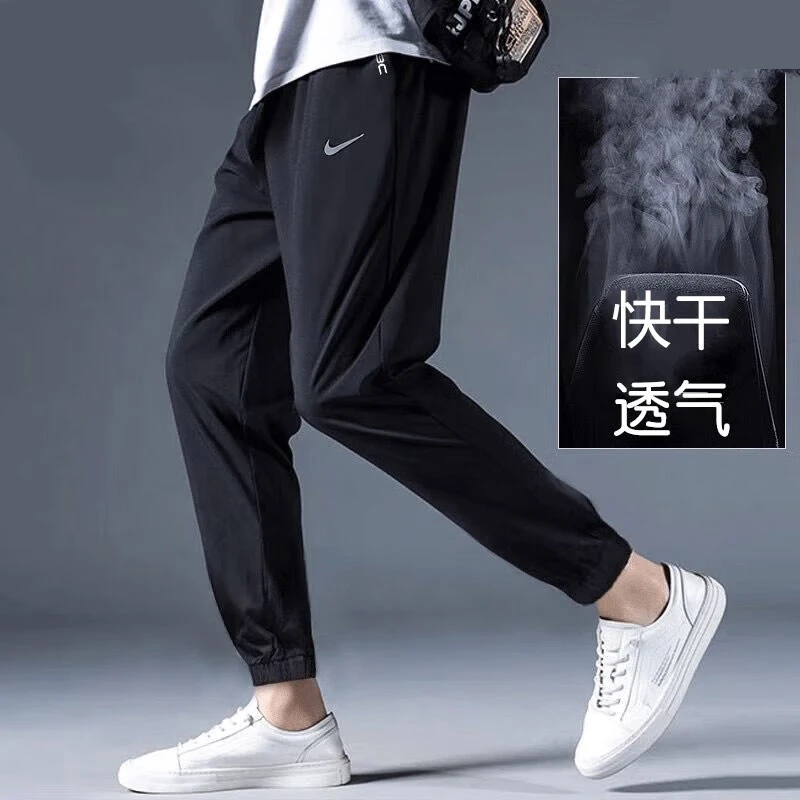 NIKE耐克裤子2025新款男装梭织薄款黑色长裤束脚休闲运动裤FB7491