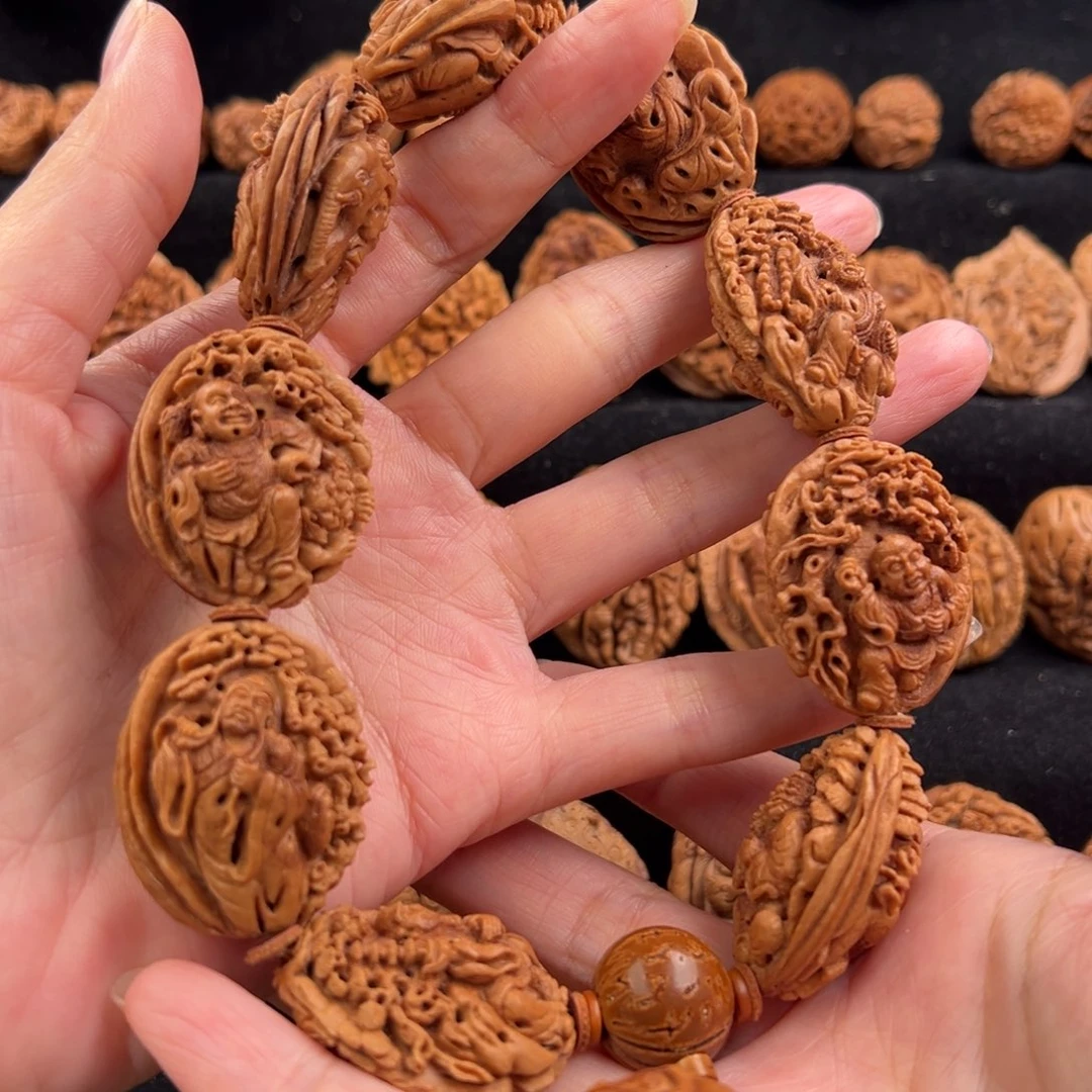 吊坠桃核?**?桃核雕刻十八罗汉手串