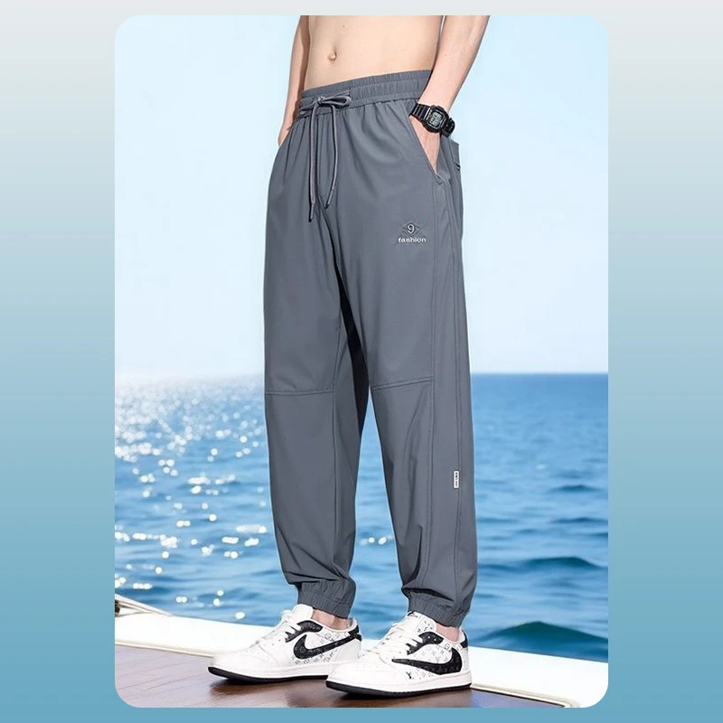 夏天弹力休闲裤男凉感速干冰丝裤子男夏季薄款高端运动束脚裤男款