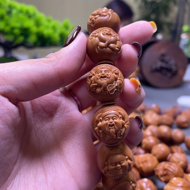 舍***得吊坠橄榄核橄榄核雕