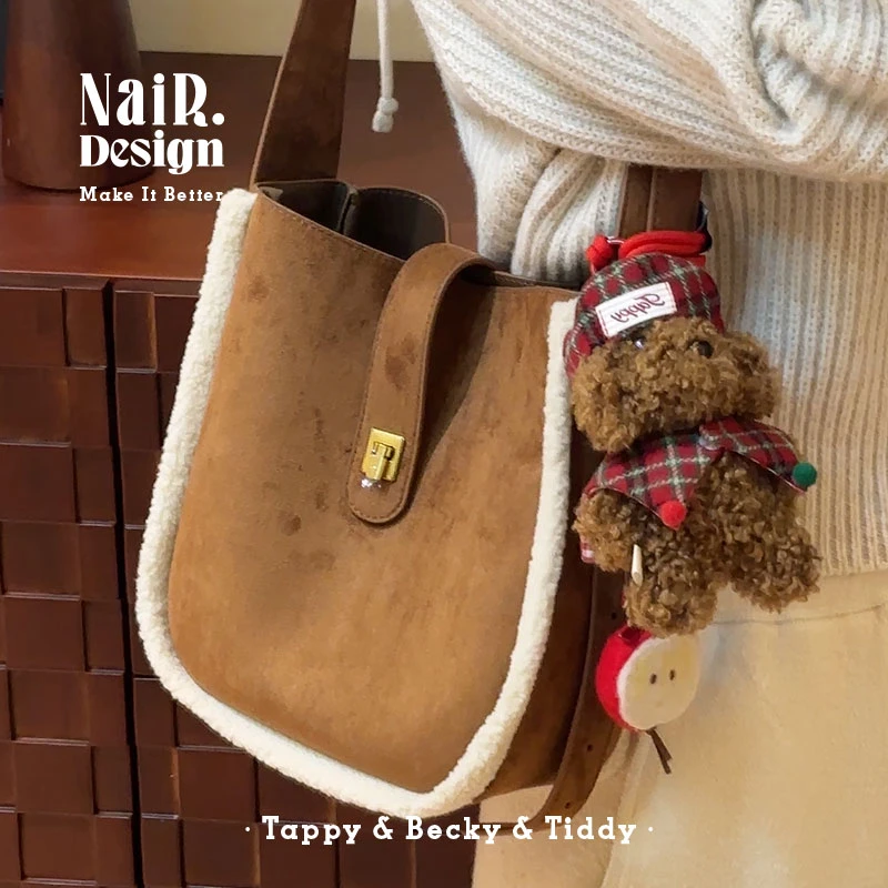 古莉奈尔鹿皮绒水桶包冬季绒绒感单肩斜跨包女百搭通勤时尚简约包