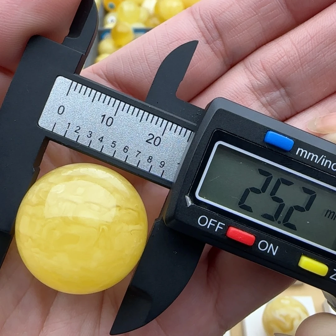 高***桐蜜蜡未镶嵌裸石瑕疵珠子