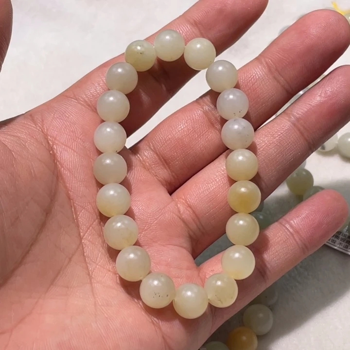阿***丽未镶嵌手串和田玉