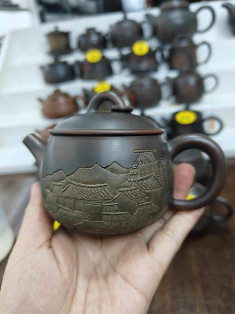 容量大约218毫升，坭兴陶特价瑕疵壶