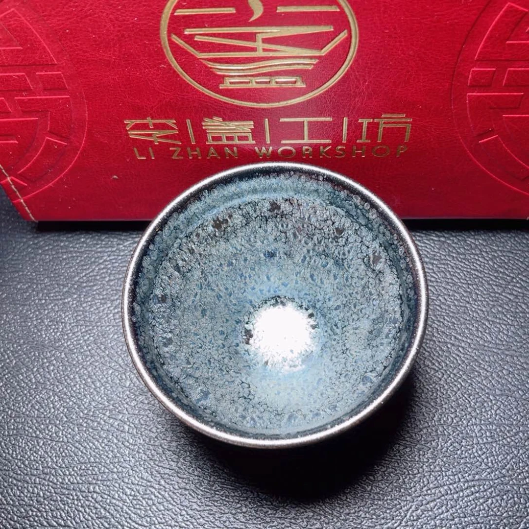 茶盏滴滴答答的声音响