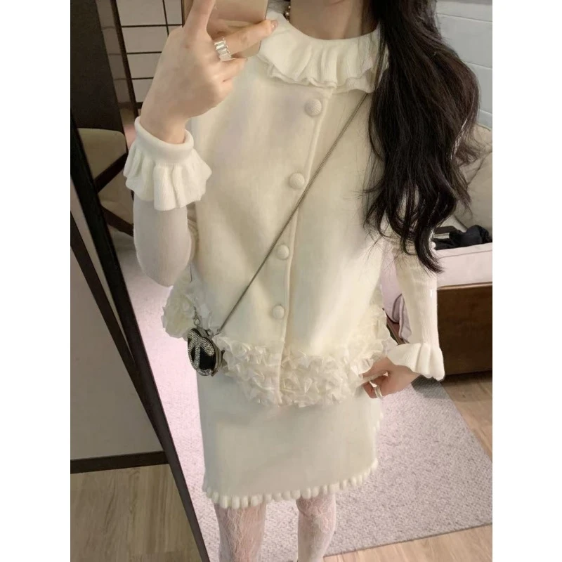 重工设计感木耳边白色针织马甲开衫女修身针织衫内搭花边半身短裙