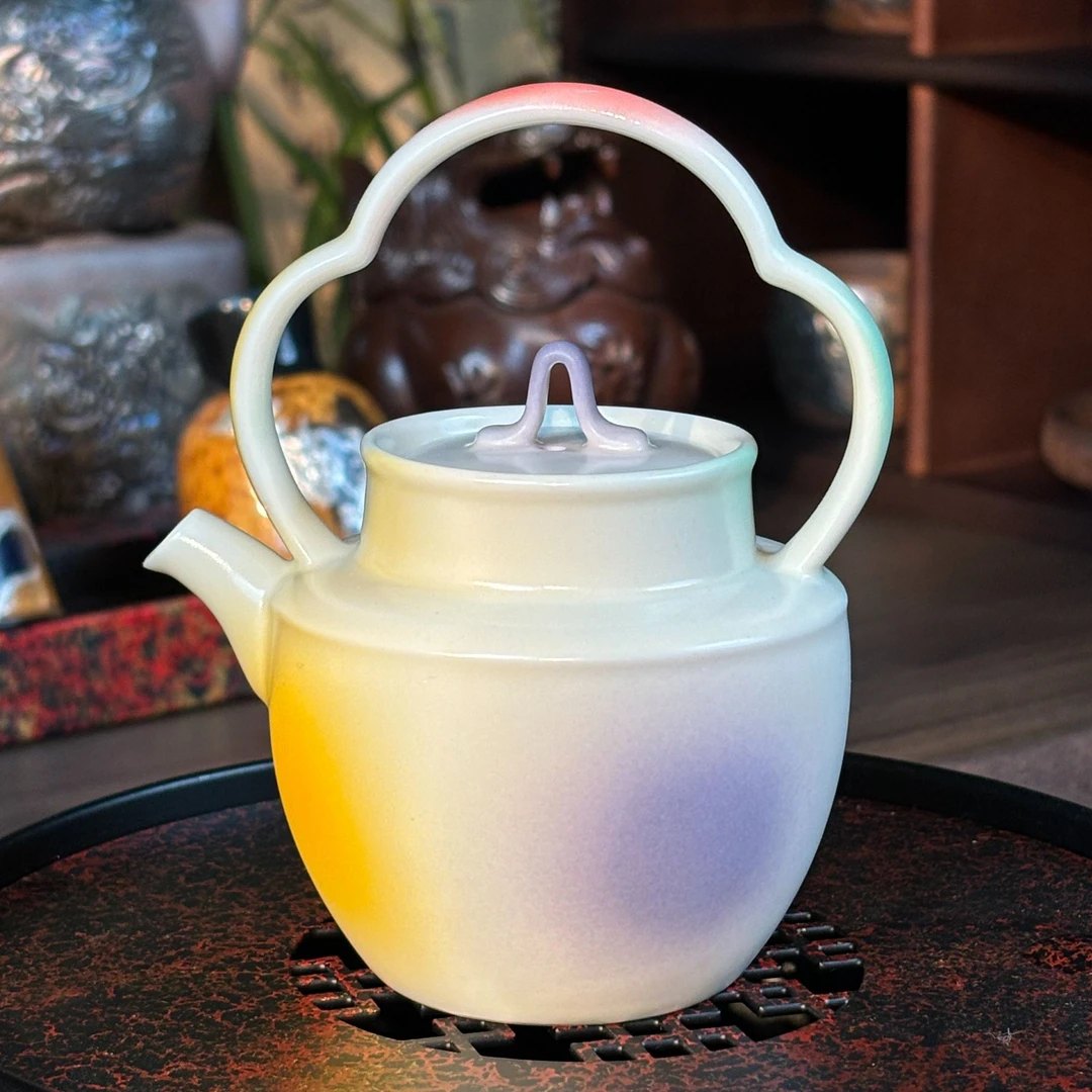 桃花洞釉祥云提粱壶