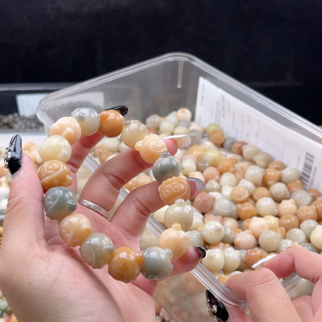 白玉菩提吊坠q16mm20颗。玉化拉布布 大果