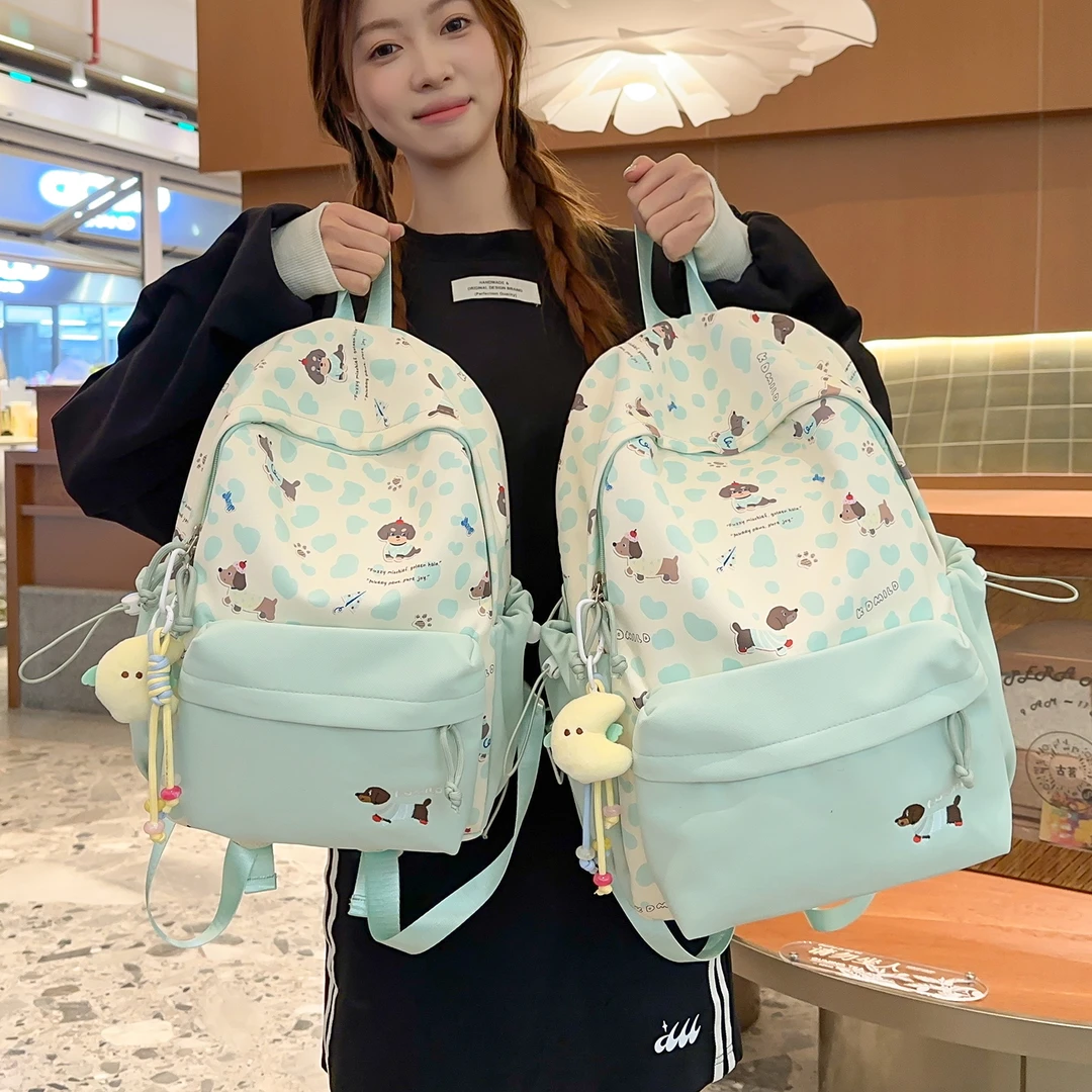 日系ins可爱书包女初中生印花背包小学生大容量减负上课背双肩包