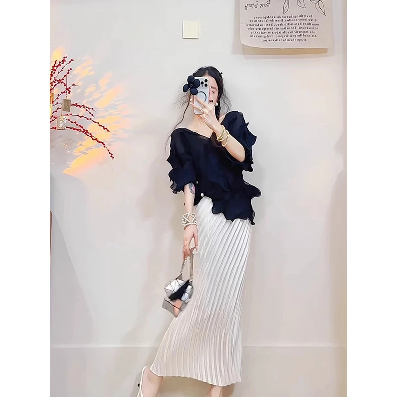 三宅2025年春季新款显瘦不规则荷叶边黑色褶皱上衣包臀半身裙套装