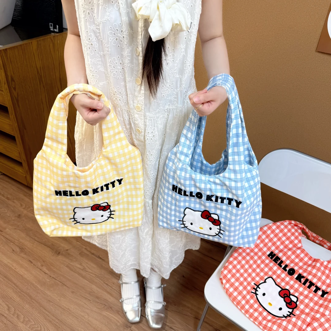 卡通可爱凯蒂猫帆布包包2025新款休闲格子通勤手提百搭单肩托特包