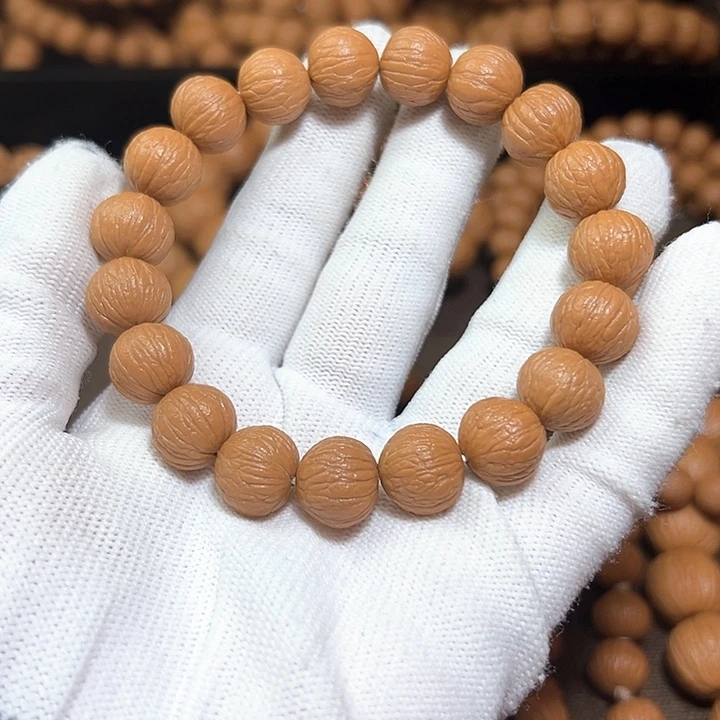 哈***哈手串桃核13凤羽猴头