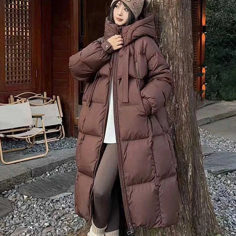 沫沫韩版长款飘带过膝连帽羽绒服女飘带白鸭绒2025冬季新款面包服