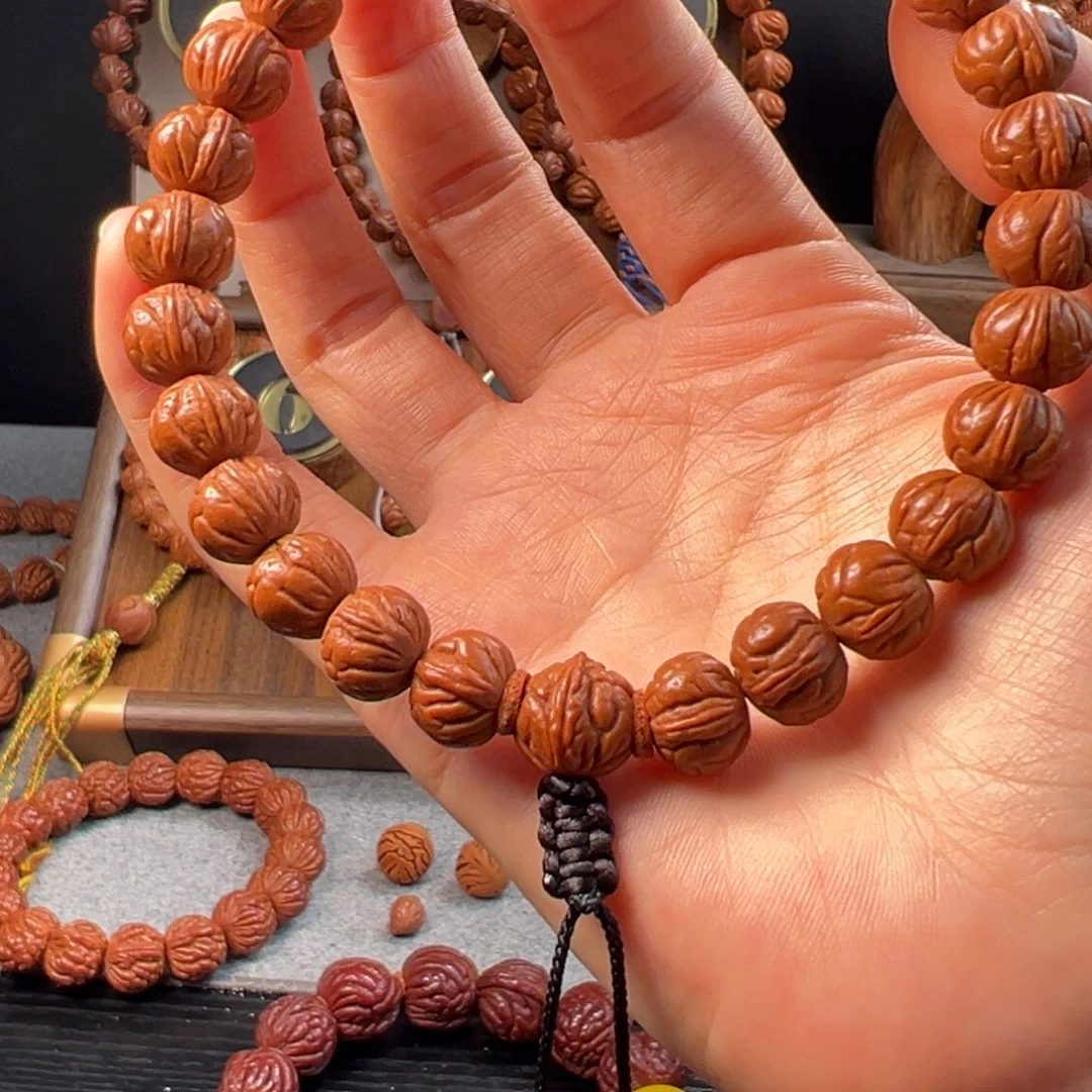 桃核手串11野生玉麒麟
