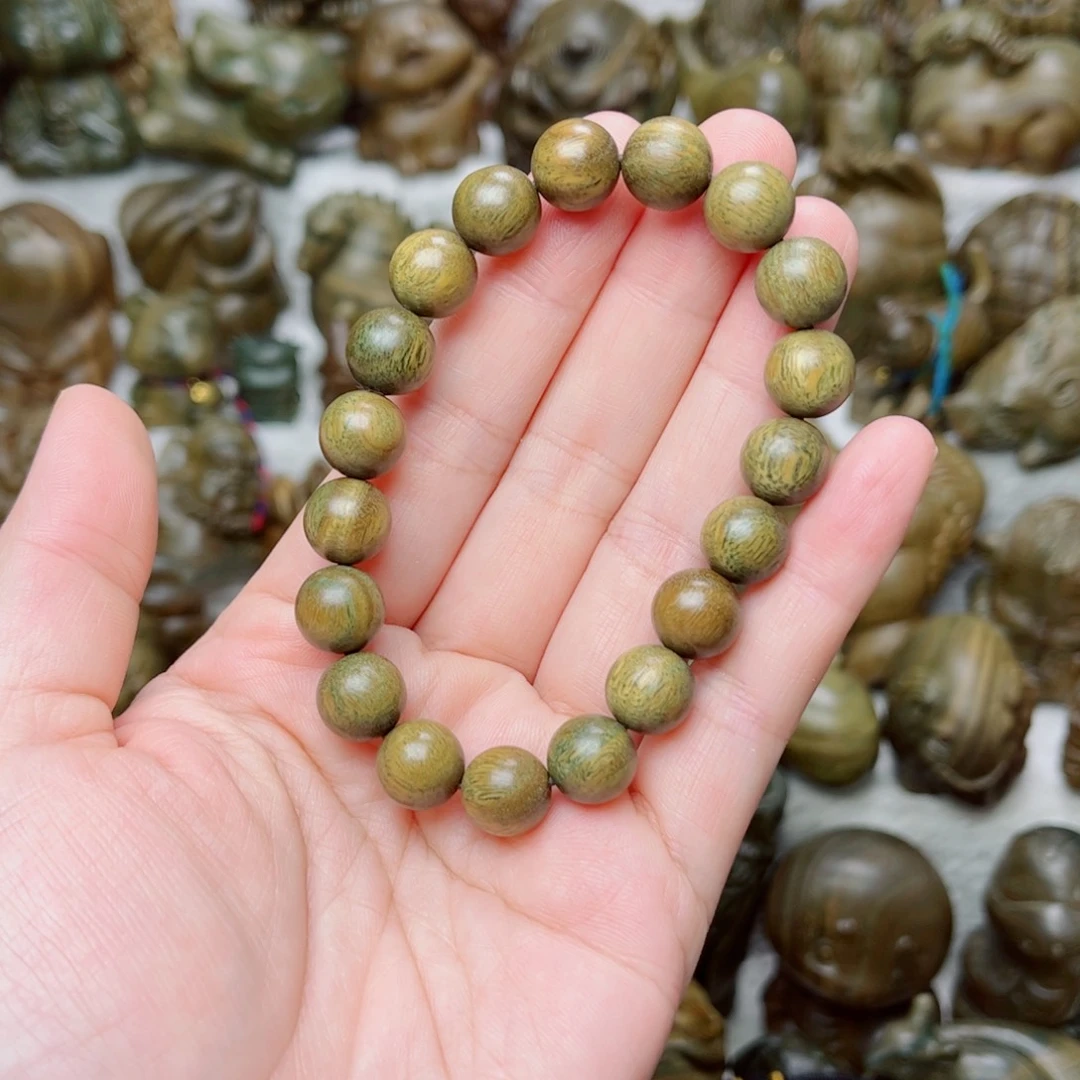 维腊木（绿檀）A****?21颗1.0穿成串，送长点弹力绳