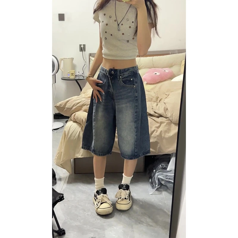 大码高街廓形弯刀七分牛仔裤女夏季新款做旧水洗设计感休闲短裤潮