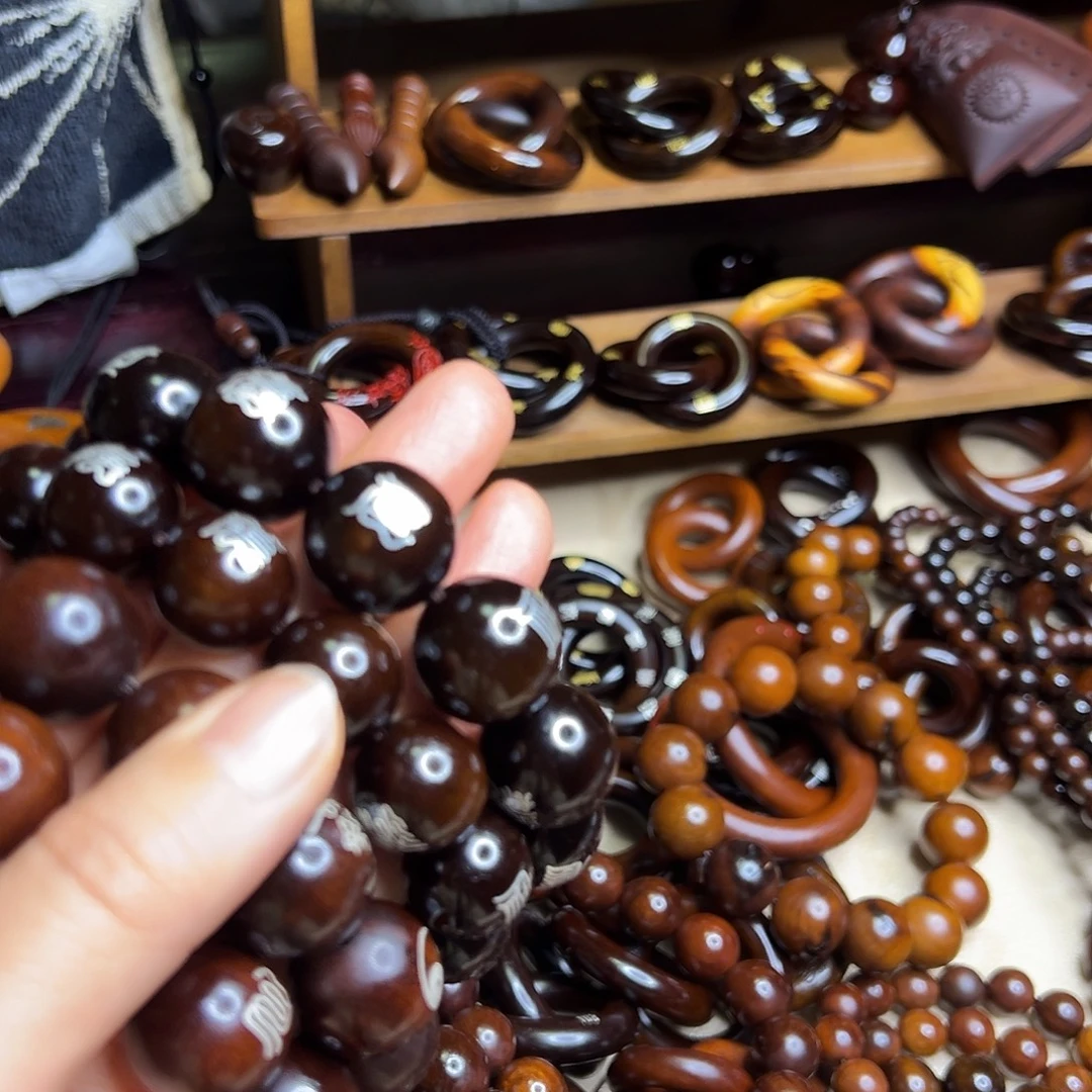 尘***影2.0内径枣木老料镶银手串