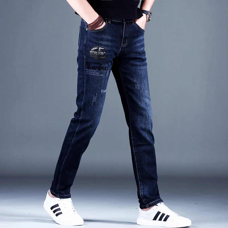 男士蓝色印花牛仔裤男款2025新款春秋季潮牌高端时尚裤子修身小脚