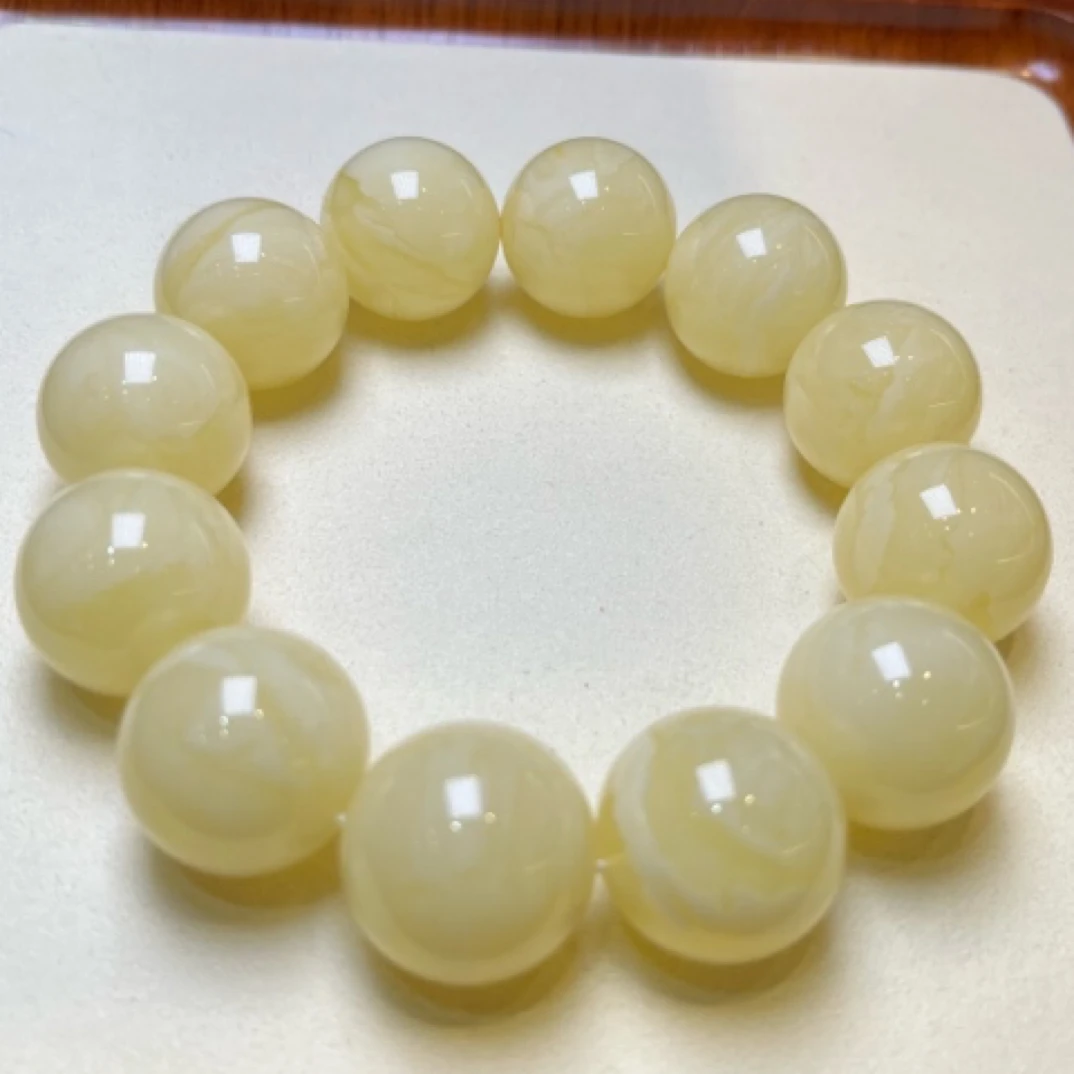20mm乌料奶白同料串克重54.18克