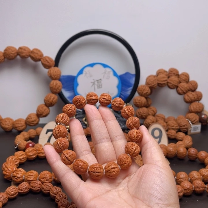 文玩核桃手串想**鱼核桃手串