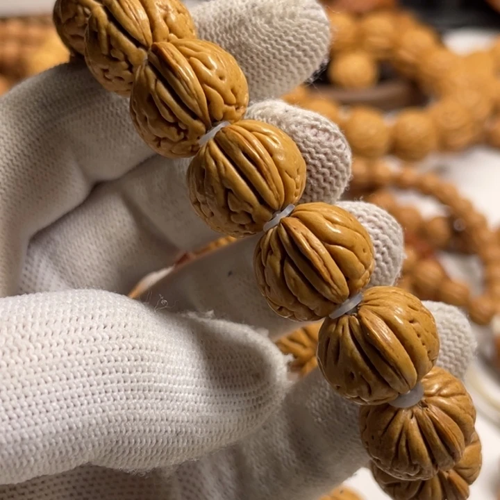 杜***游吊坠桃核桃核手串