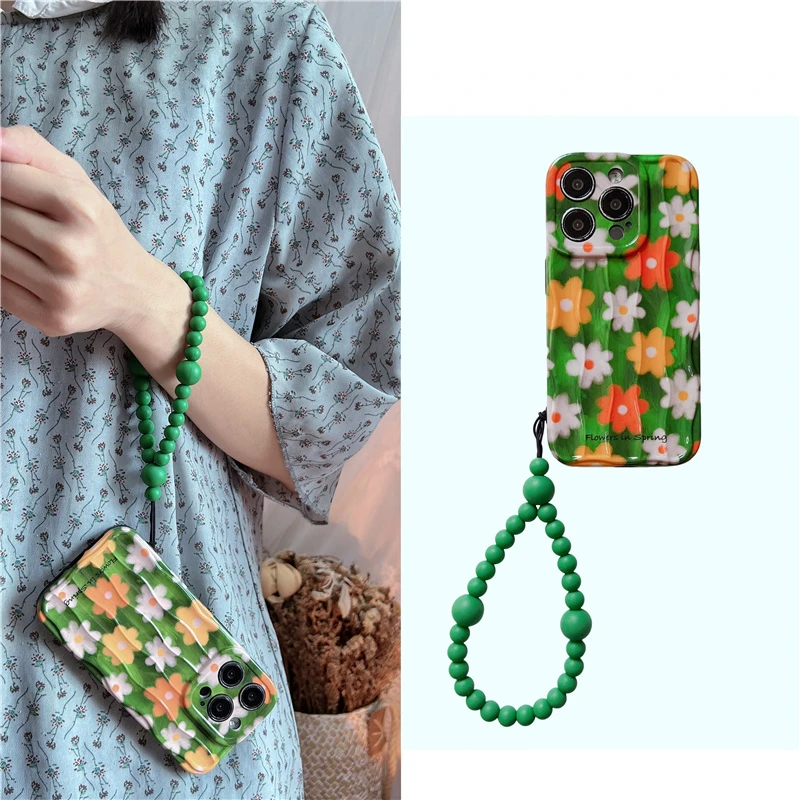 绿色波纹春夏满屏花朵适用苹果15/14/13弹力手链珠iphone16手机壳