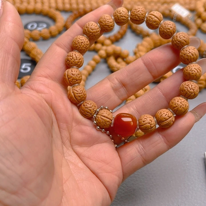 火***洋吊坠桃核桃核手串