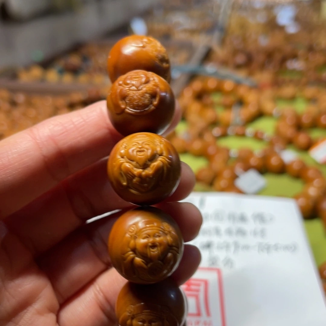 橄榄核吊坠正圆财神