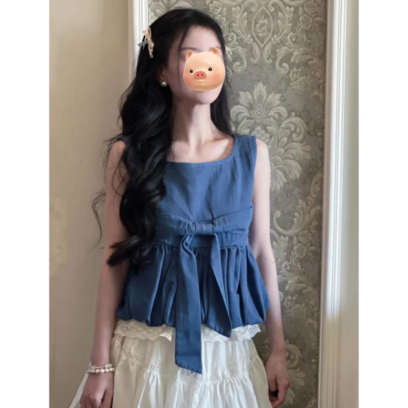 法式甜美蕾丝拼接蝴蝶结牛仔吊带背心夏季外穿宽松无袖娃娃衫上衣