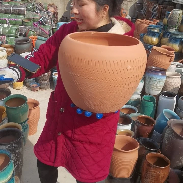 红陶口25高26瑕疵一个盆