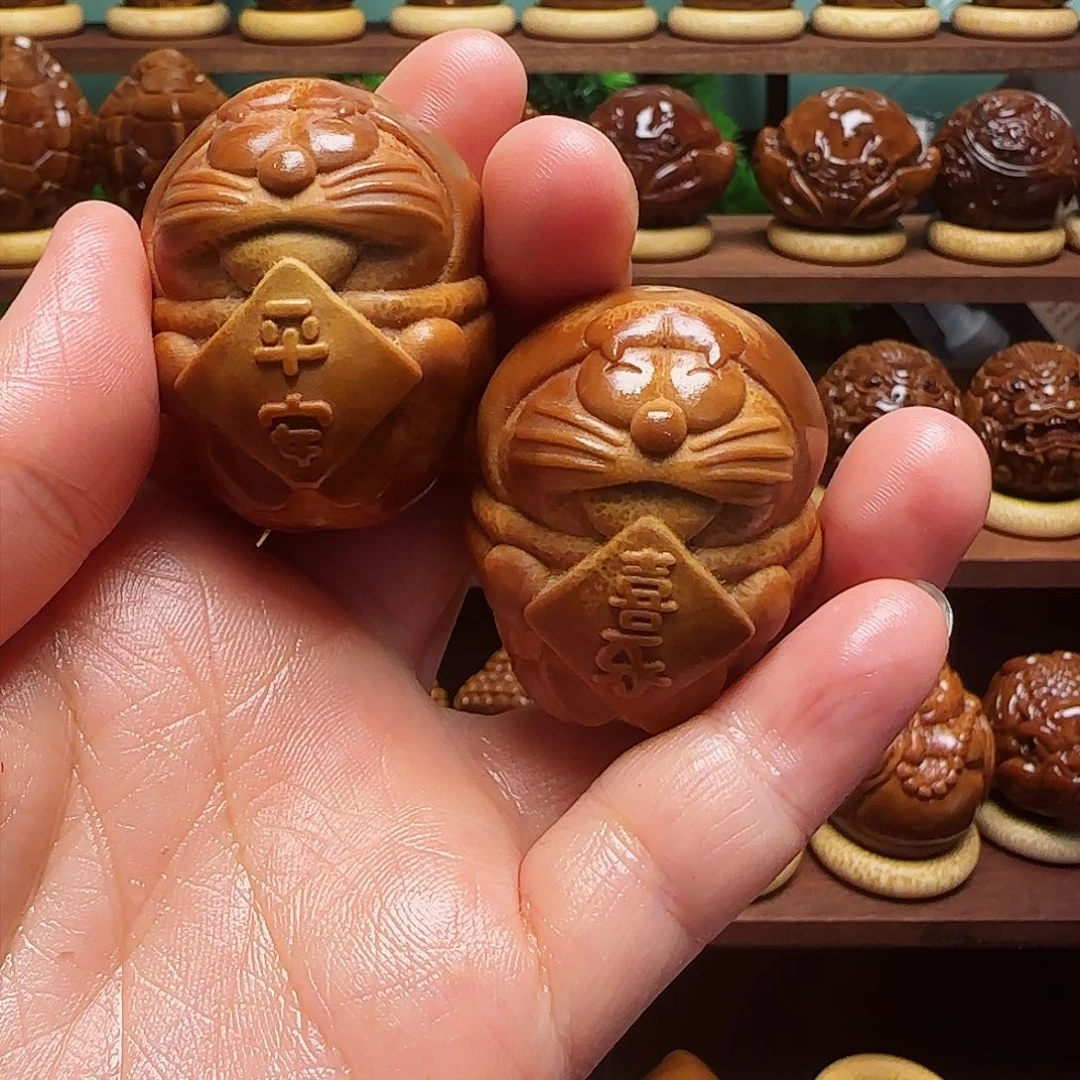 橄榄核手串/手链老*机器猫一对